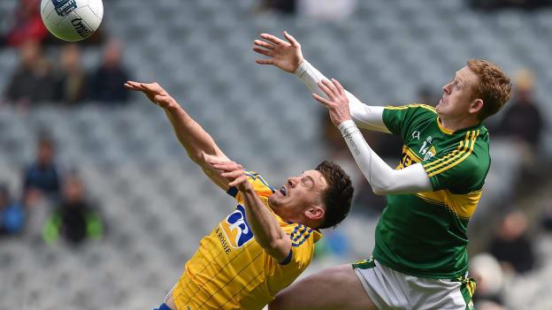 Neil Collins and Colm Cooper in action at Croke Park.