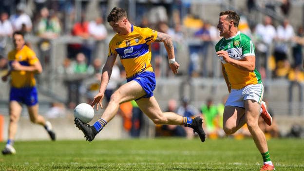 Ciaran Malone, Clare, and Michael Brazil, Offaly, in action at Bord Na Mona O'Connor Park.