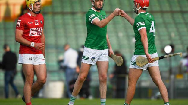 Sean Twomey of Cork with Diarmaid Byrnes, 5, and Barry Nash of Limerick after the Allianz Hurling League Division 1 Group A Round 4 match between Limerick and Cork at LIT Gaelic Grounds in Limerick. 
