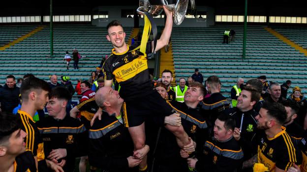 Dr Crokes captain John Payne celebrates with the Bishop Moynihan Cup after 2018 Kerry final win over Dingle.
