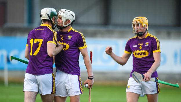 Wexford players, from left, Garry Molloy, Rowan White and Damien Reck, celebrate their Bord Gáis Energy Leinster U-21 Hurling semi-final victory over Dublin.