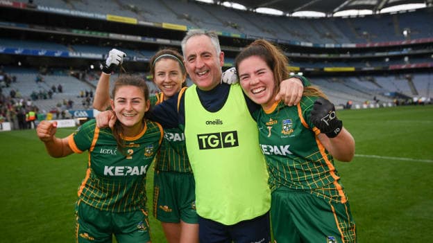 Meath manager Eamonn Murray celebrates with players, from left, Emma Troy, Niamh O'Sullivan and Shauna Ennis following the TG4 All-Ireland Senior Ladies Football Championship Semi-Final match between Cork and Meath at Croke Park in Dublin.