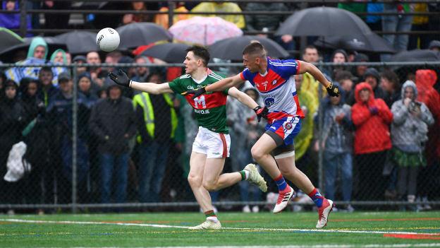 Fergal Boland, Mayo, and Matthew Queenan, New York, during the Connacht Senior Football Championship Quarter-Final at Gaelic Park.
