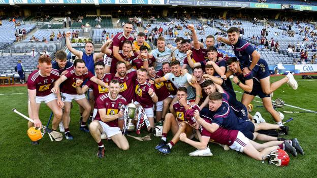 The Westmeath players celebrate with the Joe McDonagh Cup after victory over Kerry.