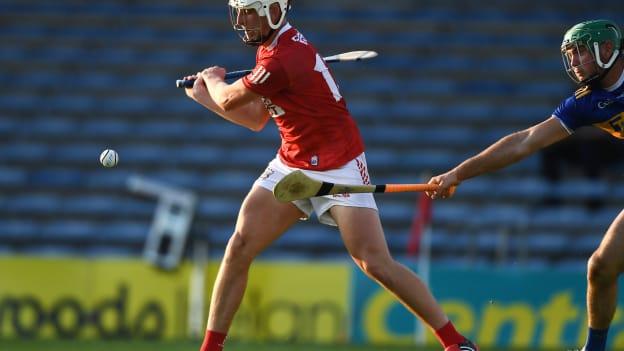 Robbie Cotter of Cork scores his side's second goal despite the efforts of Fintan Purcell of Tipperary during the Munster GAA Hurling U20 Championship semi-final match between Tipperary and Cork at Semple Stadium in Thurles, Tipperary. 