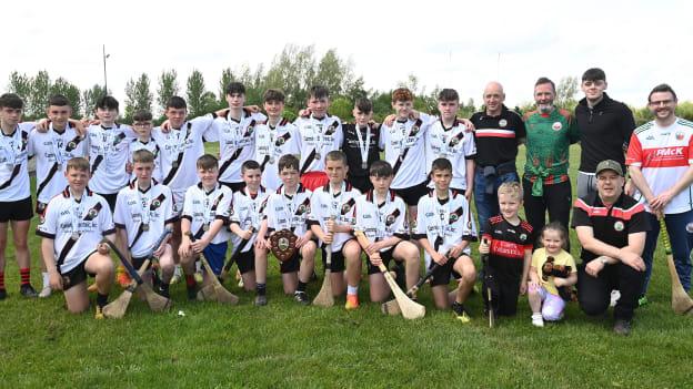The Naomh Colmcille/Duchie Neill, Co Tyrone celebrates after the U15 Táin Óg Hurling Finals match between Naom Colmcille/Duchie Neill, Co Tyrone and Sean McCumhaills, Co Donegal, at Lisnaskea GAA club in Enniskillen.