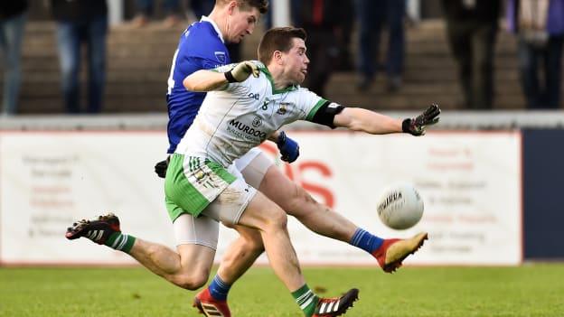 Scotstown's Darren Hughes on the attack against Burren.