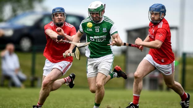 Sean Corrigan of Fermanagh in action against Paddy Lynch, left, and Andrew Smyth of Louth during the 2021 Allianz Hurling League Roinn 3B match between Louth and Fermanagh at Louth Centre of Excellence in Darver, Louth. 