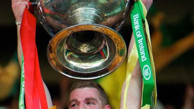 Tommy Dowd raises aloft the Sam Maguire Cup after defeating Mayo the All-Ireland Final in 1996
