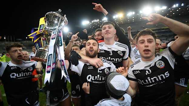 Conor Laverty of Kilcoo and team-mates celebrate with the Andy Merrigan cup after the AIB GAA Football All-Ireland Senior Club Championship Final match between Kilcoo, Down, and Kilmacud Crokes, Dublin, at Croke Park in Dublin. 