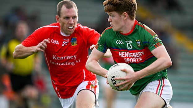 Kieran Dennehy, Mid Kerry, and Colm Ó Muircheartaigh, West Kerry, in Kerry SFC action.