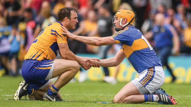 Patrick O'Connor, Clare, and Seamus Callanan, Tipperary, following the 2018 Munster Senior Hurling Championship clash at Semple Stadium.