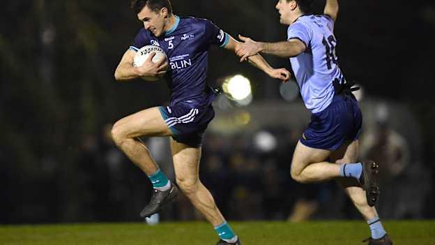 Cian Hanley, TU Dublin, and Pearse Ruttledge, UCD, in Electric Ireland Sigerson Cup action. Photo by Piaras Ó Mídheach/Sportsfile