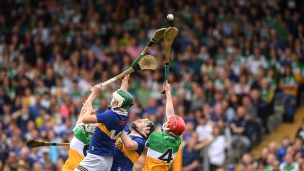 Tom Delaney and Paddy McCormack of Tipperary in action against Brecon Kavanagh and Ruairi Kelly of Offaly during the Electric Ireland GAA Hurling All-Ireland Minor Championship Final. 