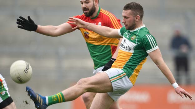 Anton Sullivan, Offaly, and Daniel St Ledger, Carlow, during the Allianz Football League Division Three encounter at Bord Na Mona O'Connor Park.