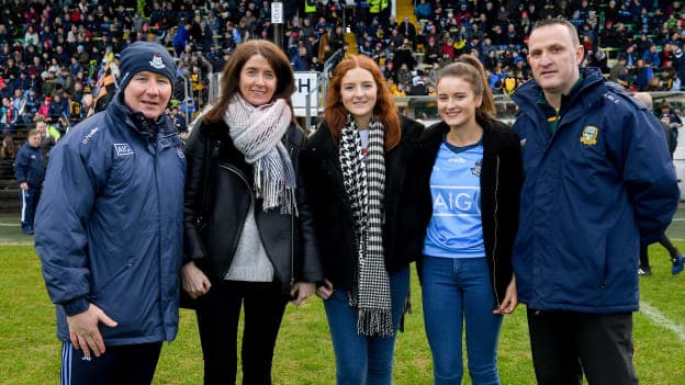 Martina Cox, wife of Seán Cox, with their daughters Emma, centre, and Shauna alongside Dublin manager Jim Gavin and Meath manager Andy McEntee before the Seán Cox Fundraising match between Meath and Dublin at Páirc Tailteann in Navan, Co Meath. 