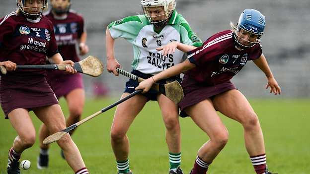 Sinead Cannon of Sarsfields in action against Clare McGrath and Dervlagh McGuigan, right, of Slaughtneil during the 2018 AIB All-Ireland Senior Club Camogie Final match between Sarsfields and Slaughtneil at St Tiernach's Park in Clones, Monaghan. Photo by Oliver McVeigh/Sportsfile