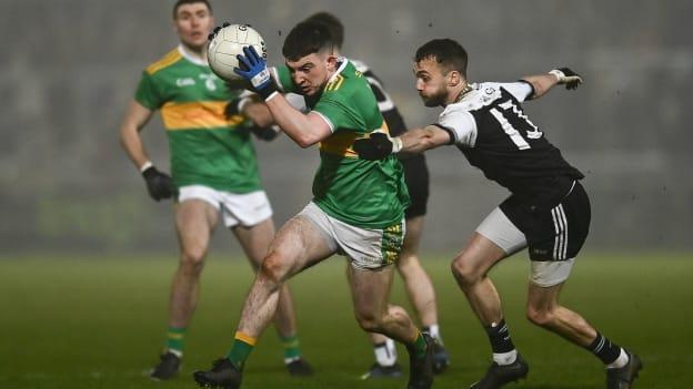 Conleth McGuckian, Glen, and Conor Laverty, Kilcoo, in AIB Ulster Club SFC action.