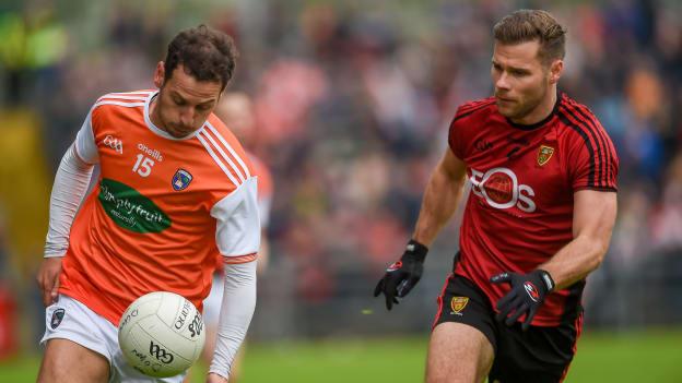 Jamie Clarke, Armagh, and Gerard Collins, Down, in Ulster Senior Football Championship action.
