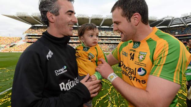 Donegal manager Jim McGuinness and his 18 month old son Jimmy celebrate with Donegal captain Michael Murphy after 2012 All-Ireland SFC Final victory over Mayo.