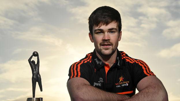 Cavan footballer, Thomas Galligan, pictured with his PwC GAA/GPA Footballer of the Month award for November. 