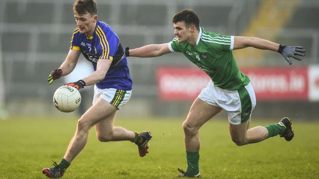 Tom O Sullivan, Kerry, and Paul White, Limerick, in action at the Gaelic Grounds on Sunday afternoon.