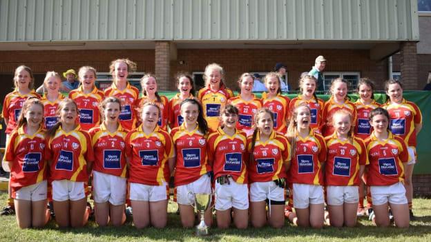 Eire Óg celebrate after winning the John West Feile Peile na nÓg Girls Division 1 title. 