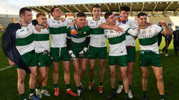 Tipperary players, left to right, Liam Boland, Kevin Fahey, Conor Sweeney, Evan Comerford, Alan Campbell, Padraic Looram, Conal Kennedy and Philip Austin celebrate after the Munster GAA Football Senior Championship Final match between Cork and Tipperary at Páirc Uí Chaoimh in Cork.