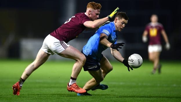 Ronan Wallace, Westmeath, and Con O'Callaghan, Dublin, collide at MW Hire O'Moore Park.