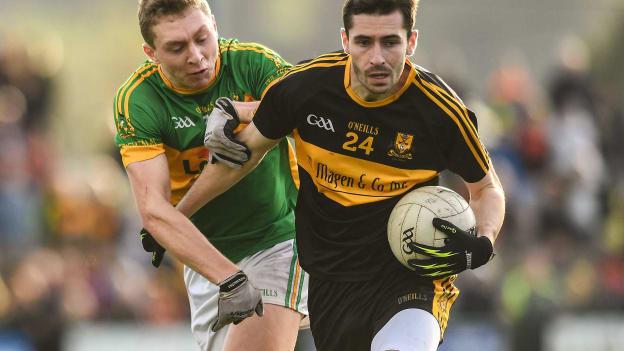 Dr Crokes Paul Clarke and Clonmel Commercials Liam Ryan in AIB Munster SFC Quarter-Final action.