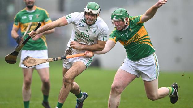 Paddy Deegan, seen here evading Oisín Mahon, was very impressive at the heart of the O'Loughlin Gaels defence this afternoon. 