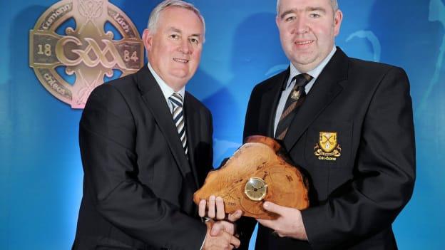 Uachtarán CLG Criostóir Ó Cuana presents JC O'Shea, from Dr. Crokes GAA Club, Co. Kerry, with his 2009 GAA MacNamee Best Technology Innovation Award. 
