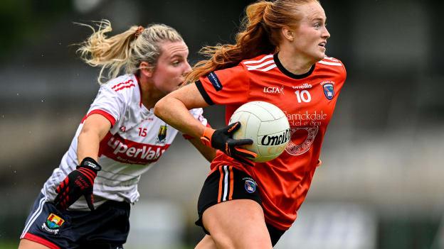 Blaithín Mackin, Armagh, and Emma Cleary, Cork, in Ladies SFC action. Photo by Ben McShane/Sportsfile