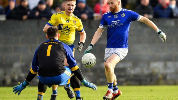 JP Rooney, Naomh Mairtin, and David Lennon, St Mochta's, during the Louth SFC Final.