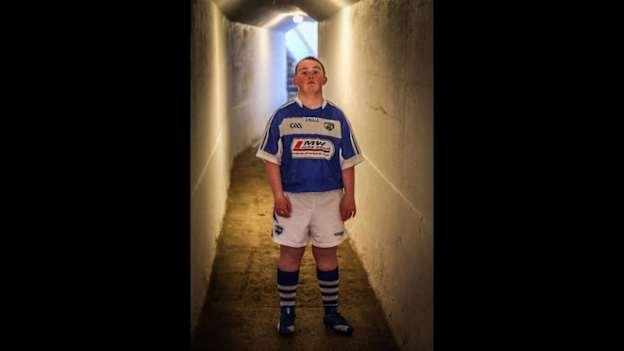 Laois team mascot and vice-captain, Jack Bolton, pictured before Laois defeated Carlow to win promotion from Division 4 of the Allianz Football League in 2018.

