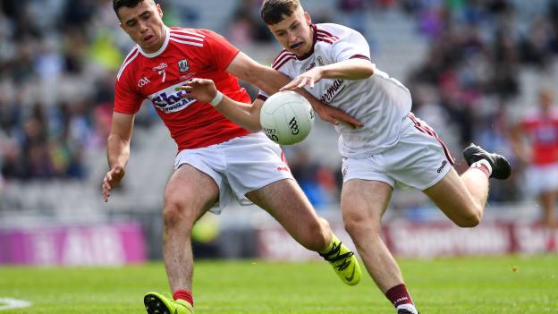 Nathan Grainger, Galway, and Joseph O'Shea, Cork, during the Electric Ireland Minor Football Final at Croke Park.