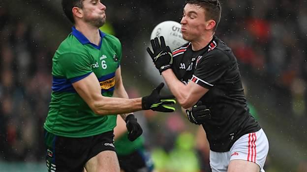 Ruairi Murphy, East Kerry, and Mark O'Connor, Dingle, in Kerry SFC action.