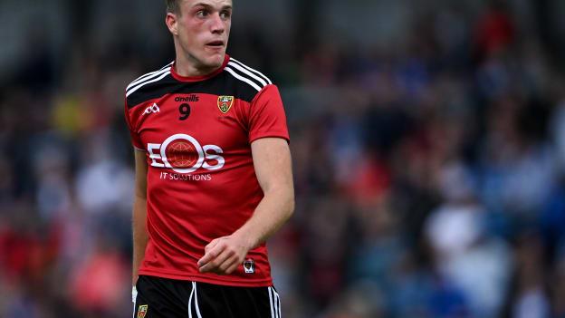 Down midfielder Tom Close will hope to guide his team to an All-Ireland decider at Roscommon's expense tomorrow. 