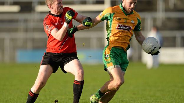 St Mary's Mark Breheny in AIB Connacht Club SFC action against Corofin's Micheál Lundy in 2015.