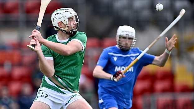 Pádraig Walsh of Ireland in action against Ruaridh Anderson of Scotland during the 2023 Hurling Shinty International Game between Ireland and Scotland at Páirc Esler in Newry, Down.