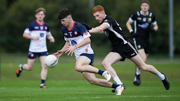 Aaron Traynor of New York is tackled by Niall Gilbride of Warwickshire during the GAA Football All-Ireland Junior Championship semi-final match between New York and Warwickshire at the GAA National Centre of Excellence in Abbotstown, Dublin. Photo by Shauna Clinton/Sportsfile.