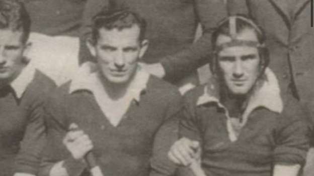 Former Cork hurler, Derry Beckett, pictured on the right wearing the first recorded hurling 'helmet' in the 1940s. 