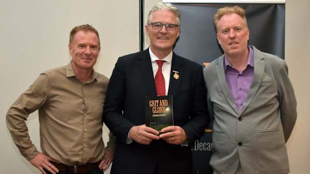 Authors Aidan and Fergal Lenehan pictured with GAA President, Jarlath Burns, at the launch of their book 'Grit and Glory - A Decade at the Club'. 