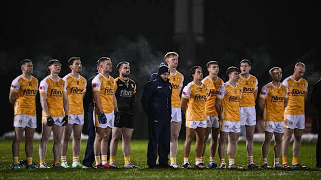 Antrim manager Mark Doran, centre, stands with his players for the playing of Amhrán na bhFiann before the Bank of Ireland Dr McKenna Cup match between Derry and Antrim at Derry GAA Centre of Excellence in Owenbeg, Derry. Photo by Ben McShane/Sportsfile.