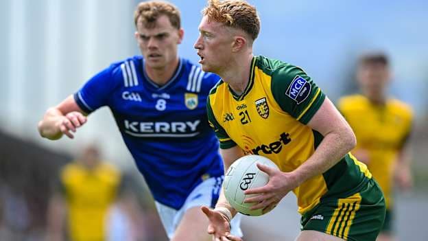 Oisín Gallen, Donegal, and Mark O'Shea, Kerry, in All-Ireland SFC action. Photo by Stephen McCarthy/Sportsfile