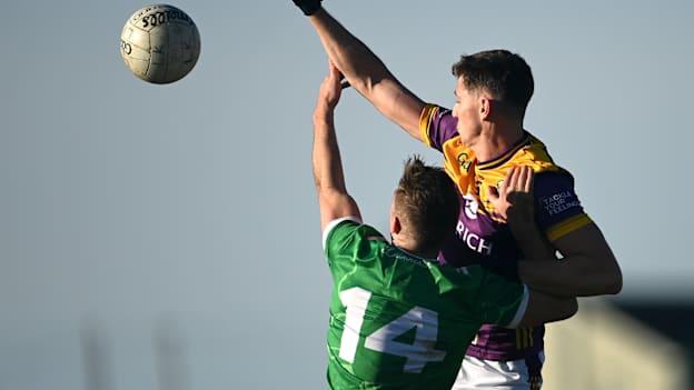 Robbie Childs, Limerick, and Gavin Sheehan, Wexford, in Allianz Football League action. Photo by Tom Beary/Sportsfile