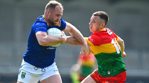 Eoin Murtagh, Wicklow, and Paddy McDonnell, Carlow, in Tailteann Cup action. Photo by Daire Brennan/Sportsfile