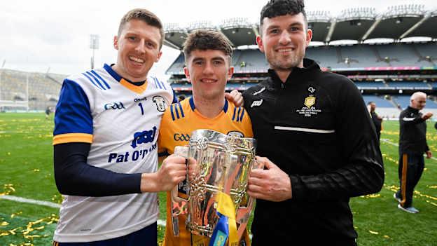 Clare players, from left, Eibhear Quilligan, Adam Hogan and Con Smith celebrate with the Liam MacCarthy cup after the GAA Hurling All-Ireland Senior Championship Final between Clare and Cork at Croke Park in Dublin. Photo by Stephen McCarthy/Sportsfile.