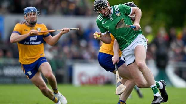 Diarmaid Byrnes, Limerick, and Tony Kelly and Shane O'Donnell, Clare, in Munster SHC action. Photo by Brendan Moran/Sportsfile