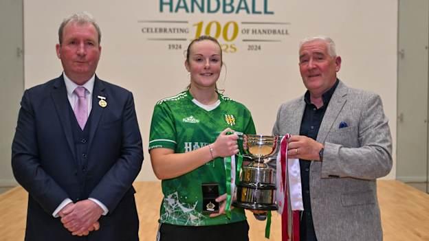 Martina McMahon is presented with the ladies Senior Singles cup by GAA Handball President Conor McDonnell and Cormac Farrell of oneills.com (sponsors).